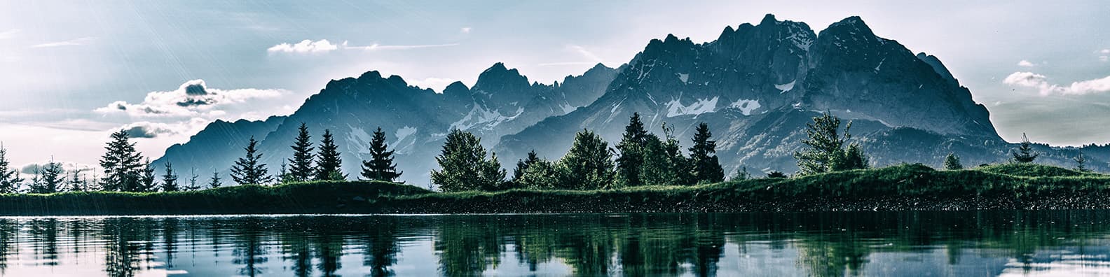Mountain range reflected in a still lake
